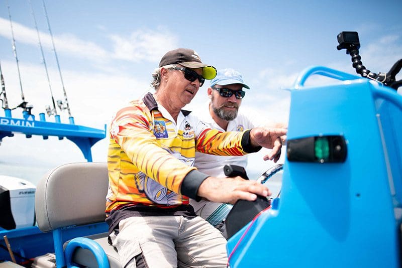 Assessing a fishing spot using the sounder.