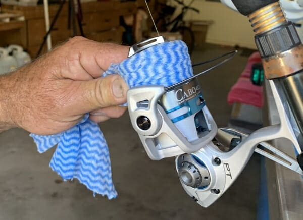 Fishing reel cleaning and maintenance - spray with Inox to keep in tip top shape.