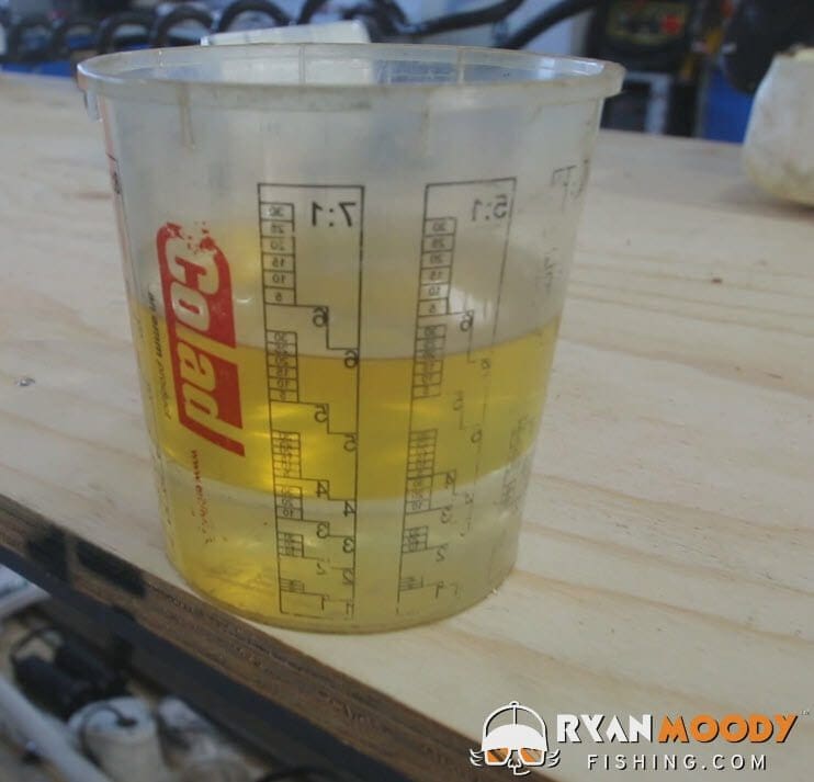 Water in outboard fuel sinks to the bottom