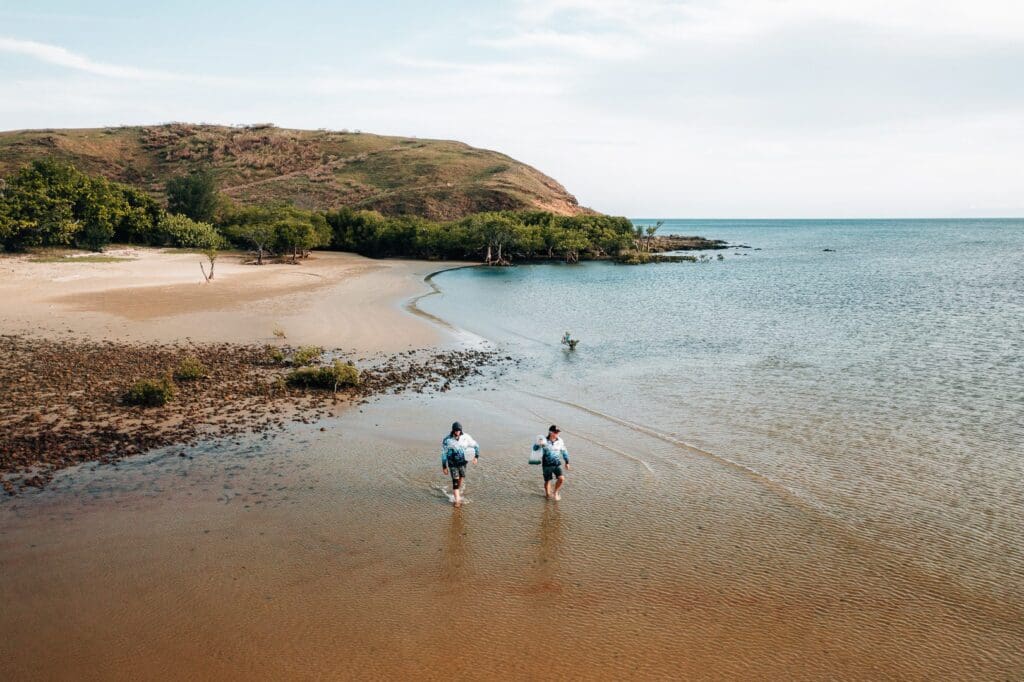Catching live bait with cast net at Cape Bedford.