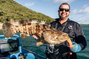 Catching estuary cod fishing Port Clinton